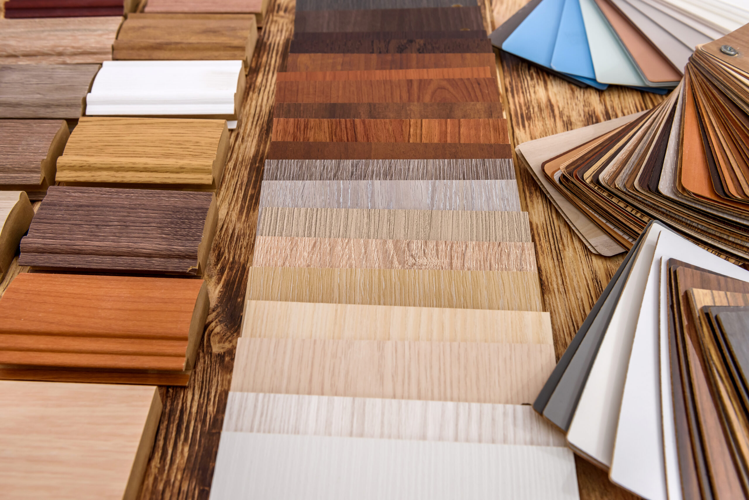 Pieces of planks on wooden background close up